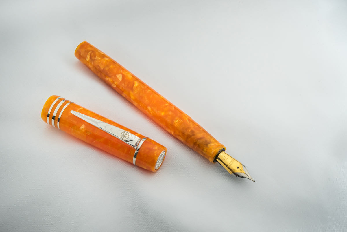 Magna Classic Orange Pearl & Silver Fittings